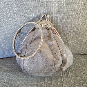 Elegant Silver Clutch with Rhinestone Handle